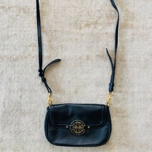 Black Tory Burch cross body bag with gold emblem